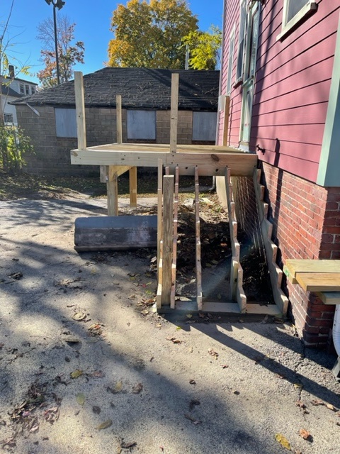 The Northeast Contracting Solutions crew built this deck and stairs to replace a rotted deck for this resident in Haverhill, MA.