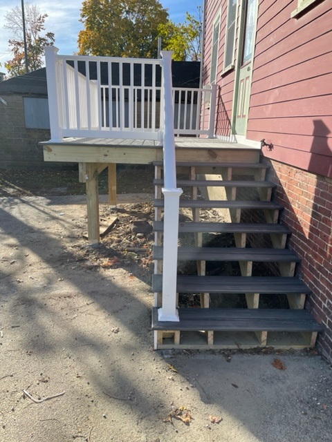 The Northeast Contracting Solutions crew built this deck and stairs to replace a rotted deck for this resident in Haverhill, MA.