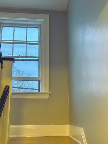 Northeast Contracting Solutions repaired and then painted the wall on this stairwell in Salem, MA.

