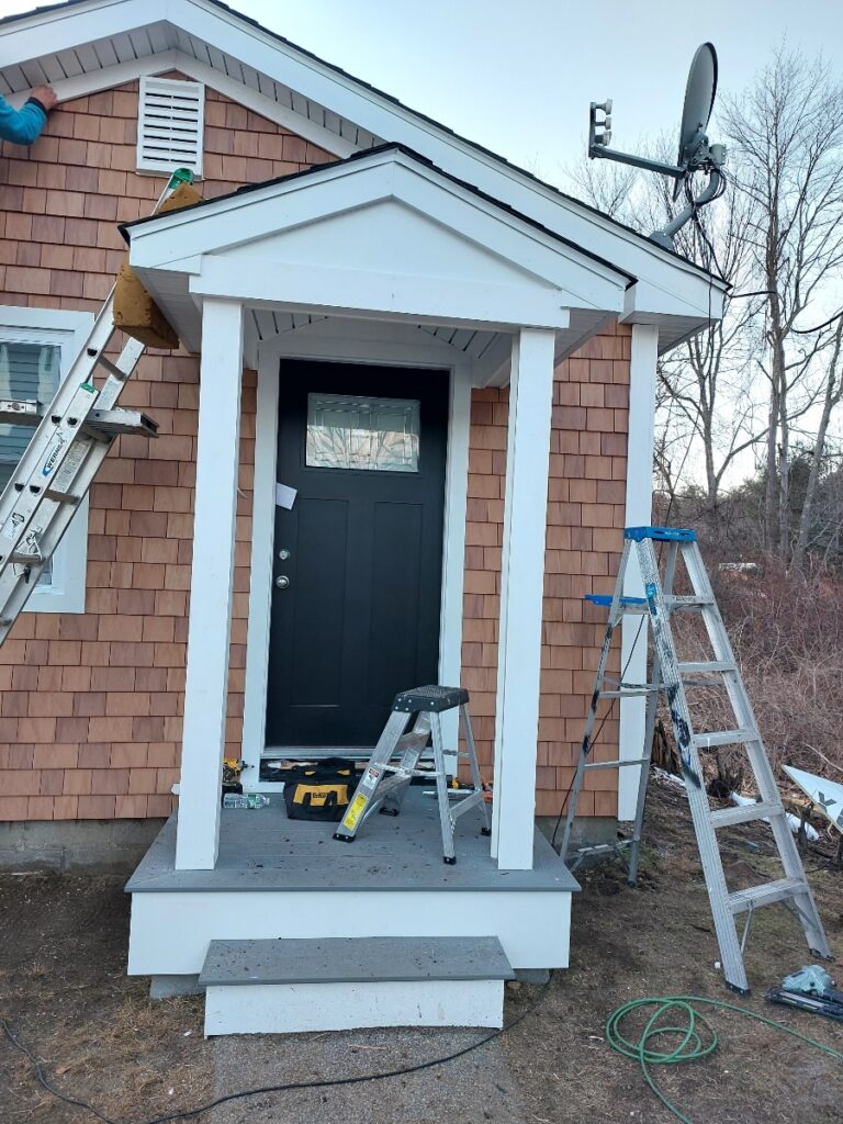 Northeast Contracting Solutions repaired and refinished the exterior of this residence in Windham, NH.